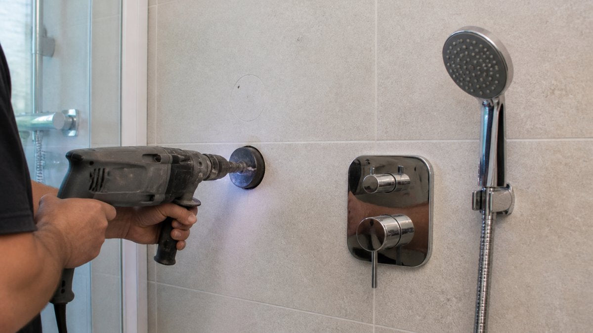 How to Cut Holes for Shower Fixtures Without Cracking Tile